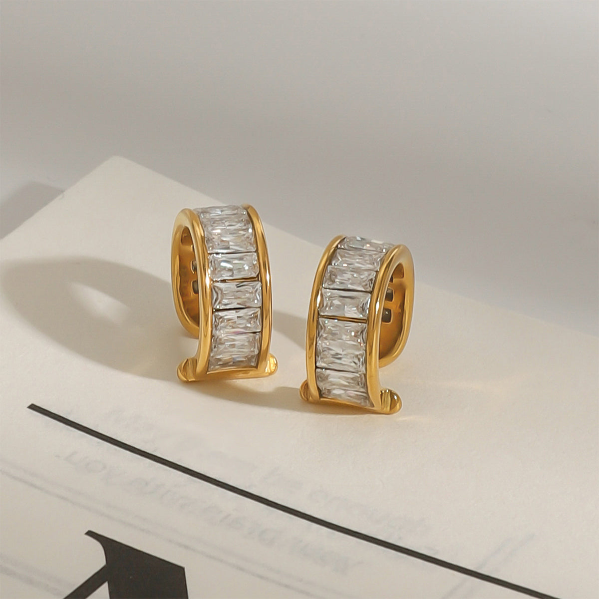 white ear cuff