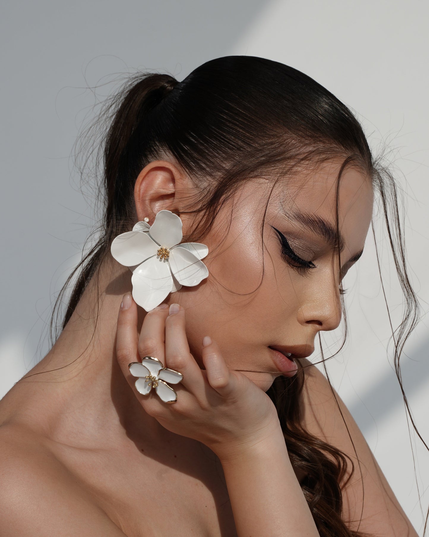 White bloom earrings