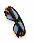 Angled view of tortoiseshell oversized sunglasses