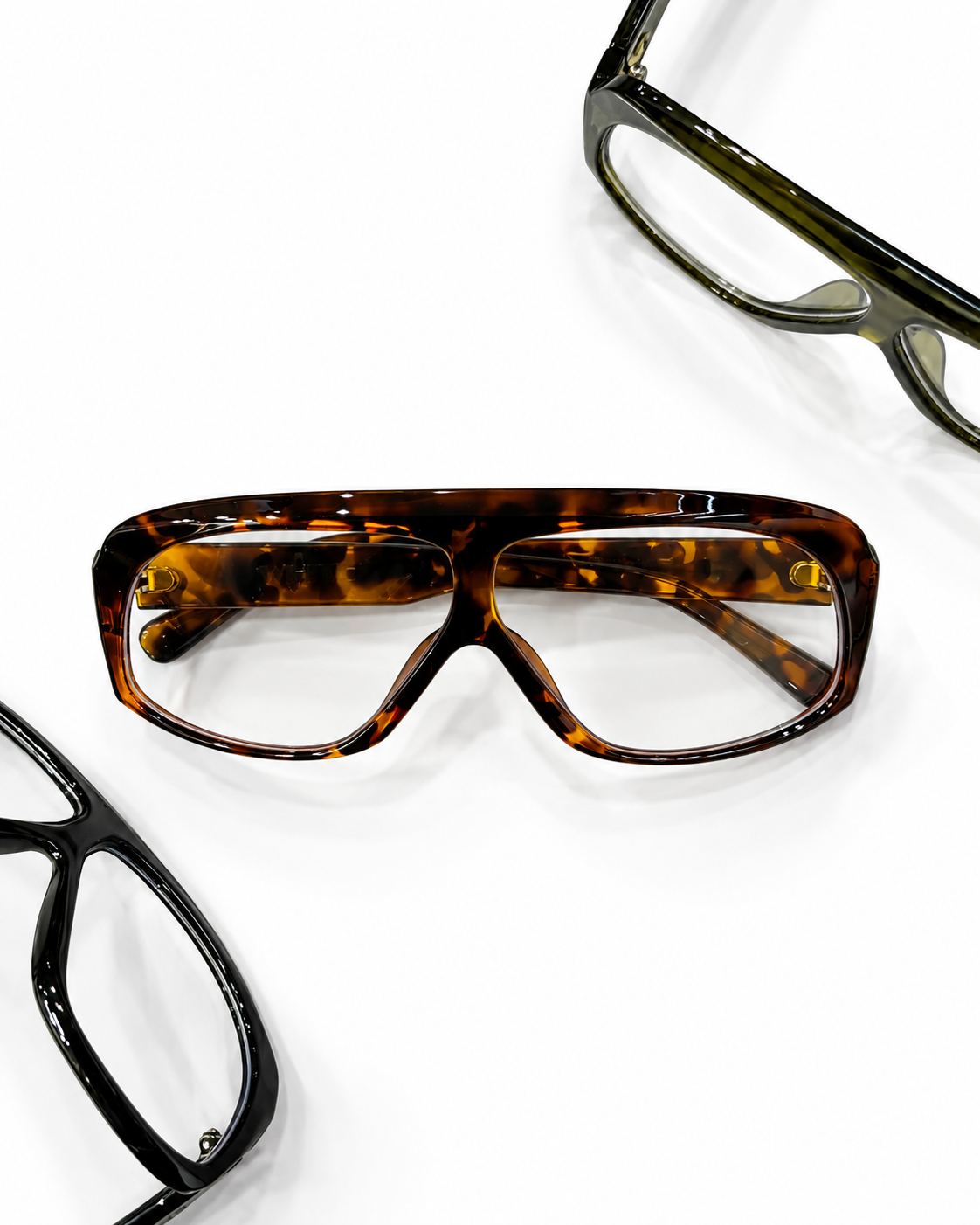 WHITE oversized square glasses in black, tortoiseshell, and olive green