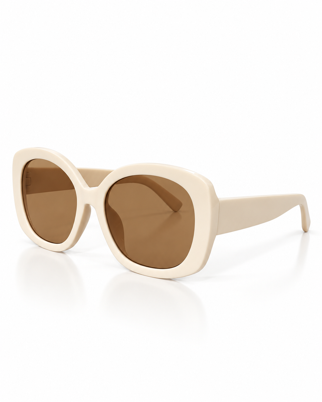 Cream oversized geometric sunglasses with glossy thick frames and warm brown-tinted lenses, angled side view.